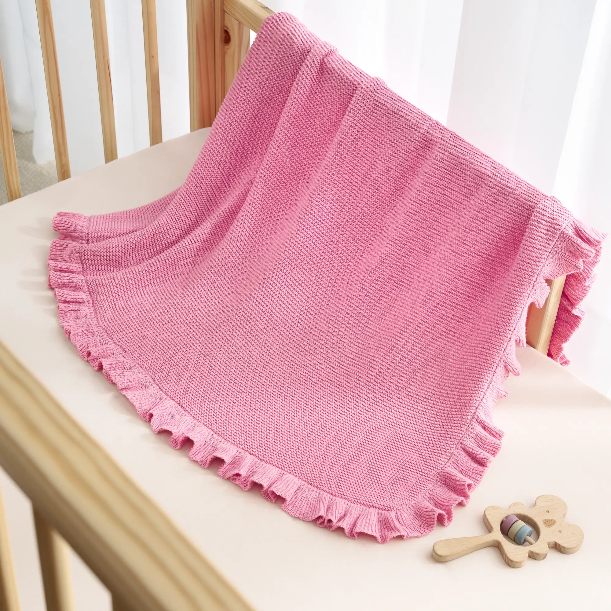 Ruffled Edge Knit Baby Blanket in Rose Pink