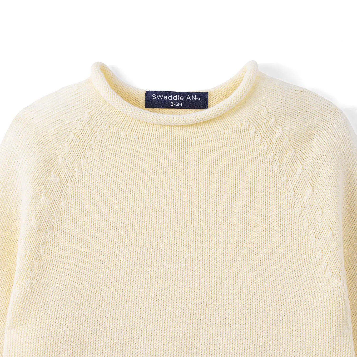 Knit Rollneck Baby Sweater in Cream