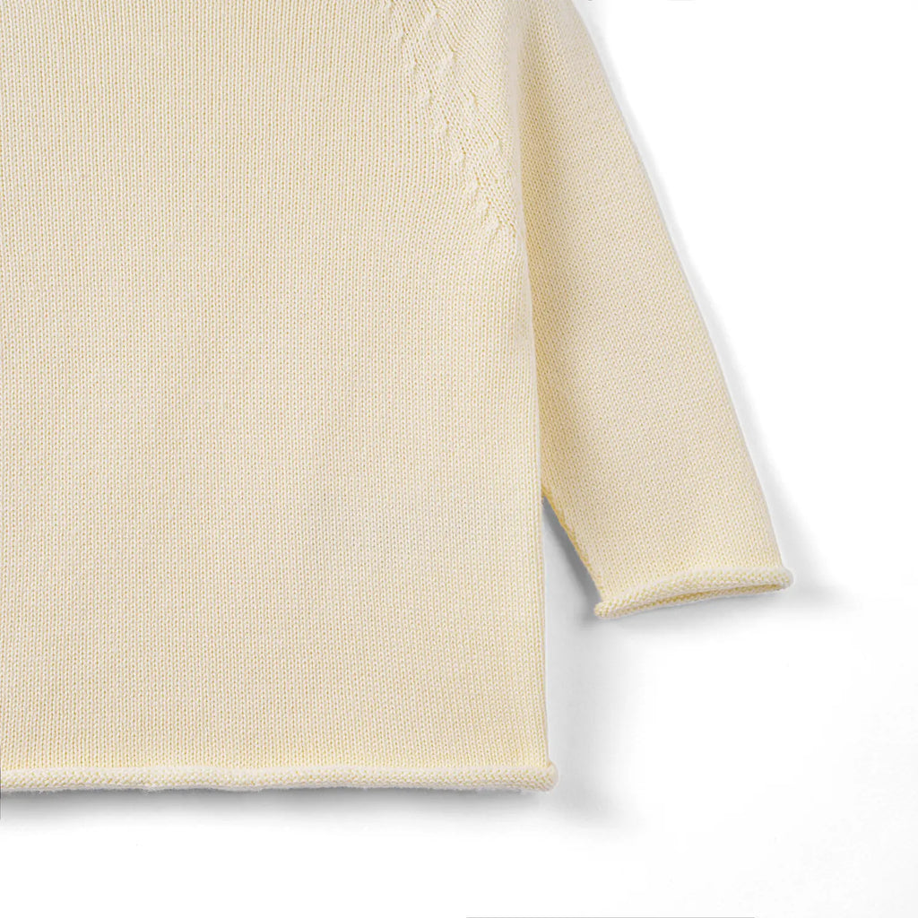 Knit Rollneck Baby Sweater in Cream
